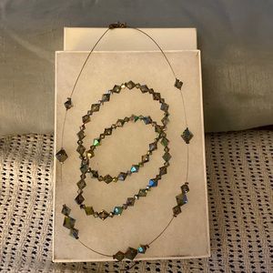 Swarovski Crystal Necklace with Two Bracelets in a Iredescent Green.. not new..
